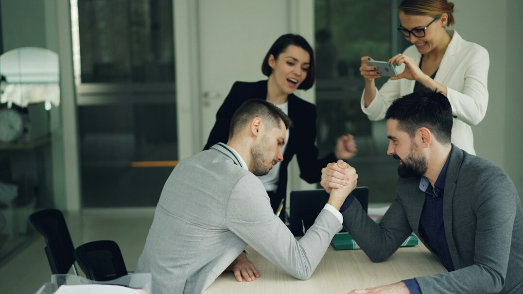 colleagues resolving conflict