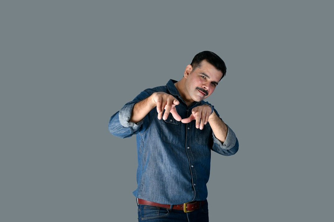man using hand gestures in conversation